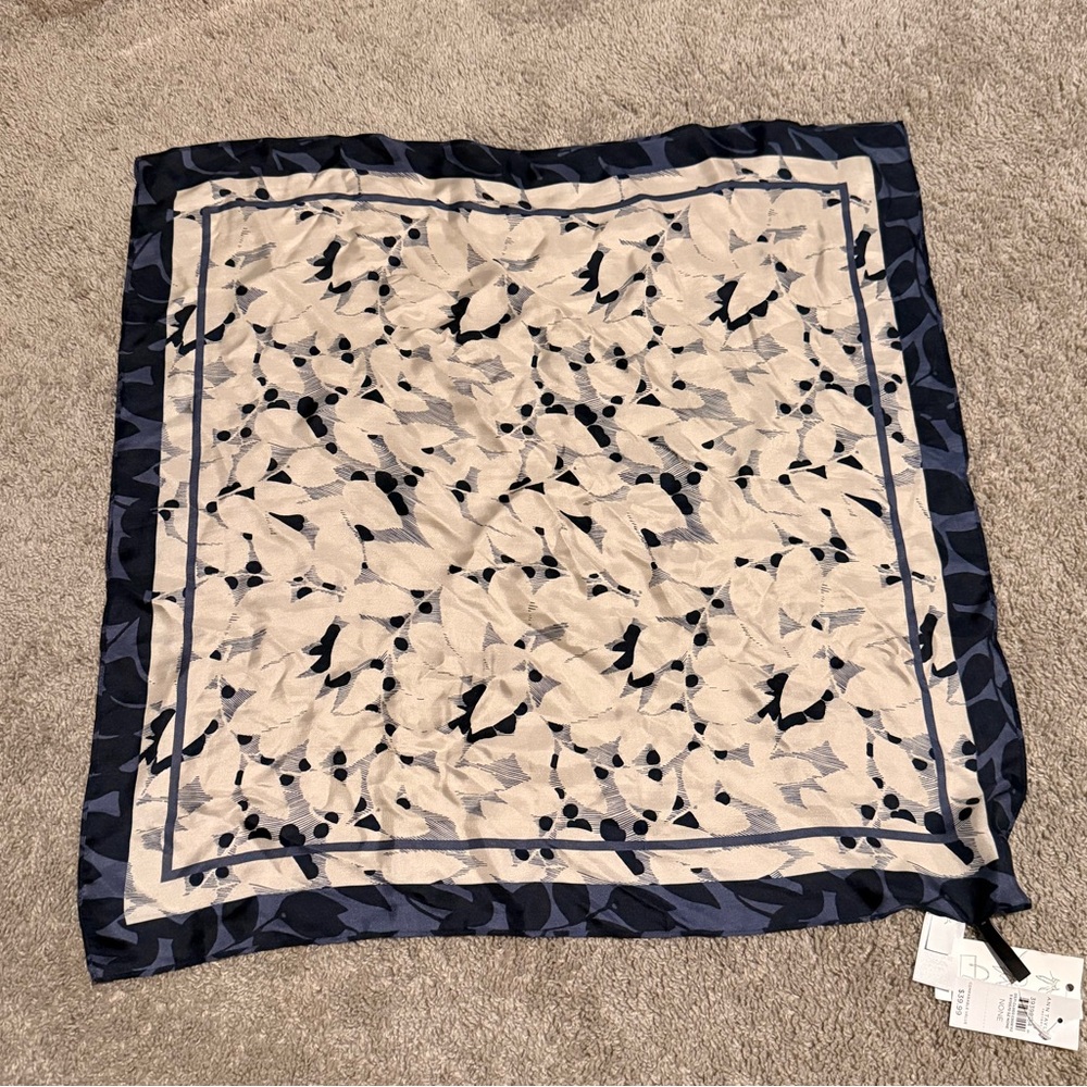 BRAND NEW WITH TAGS!! 
Ann Taylor Factory: Silk Blue and Cream Patterned Scarf
